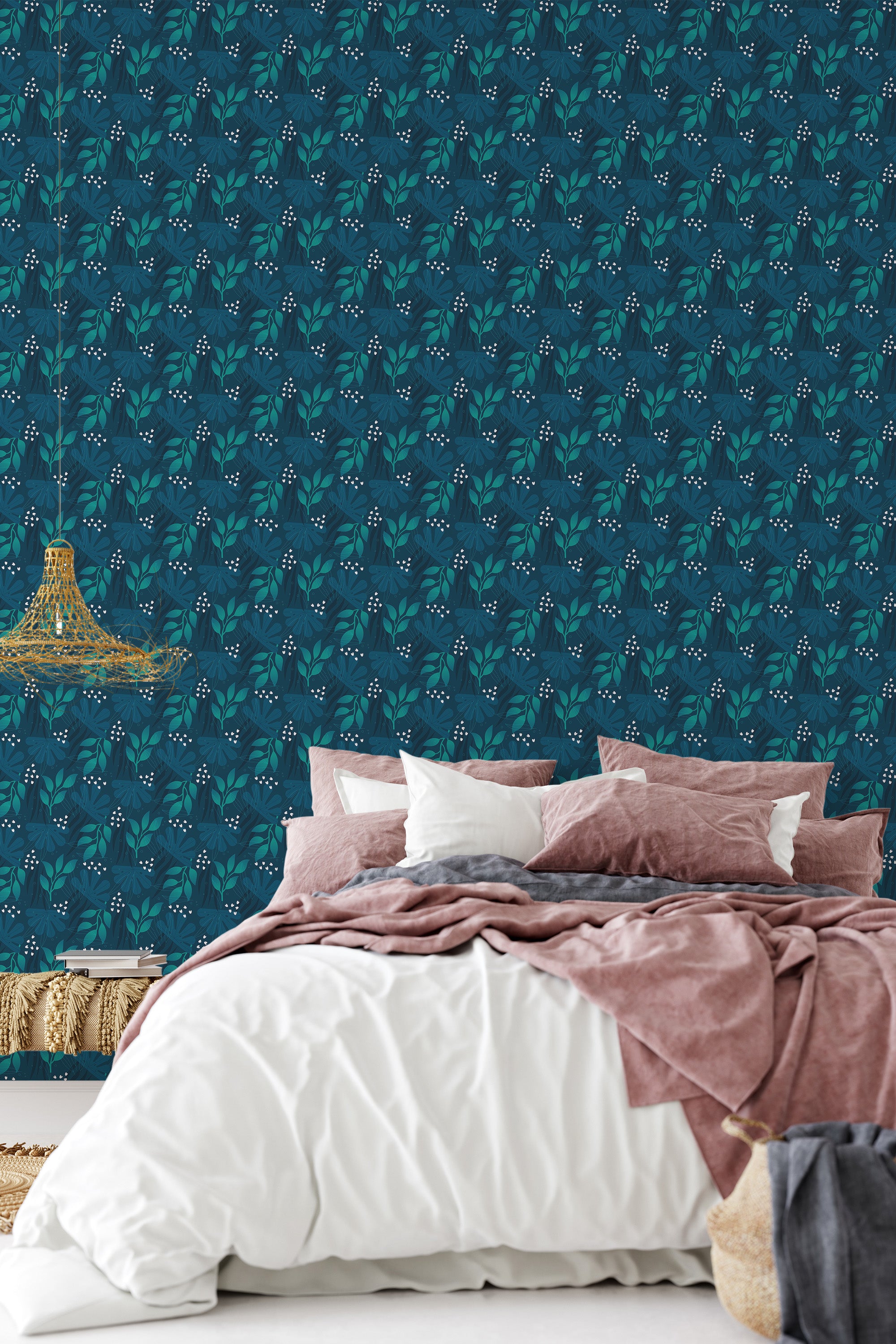 A room with a dark blue leaf pattern wallpaper, intricately detailed with leaves in various shades of blue and green, complemented by small white floral accents, giving the space a rich and sophisticated feel. Traditional wallpaper.
