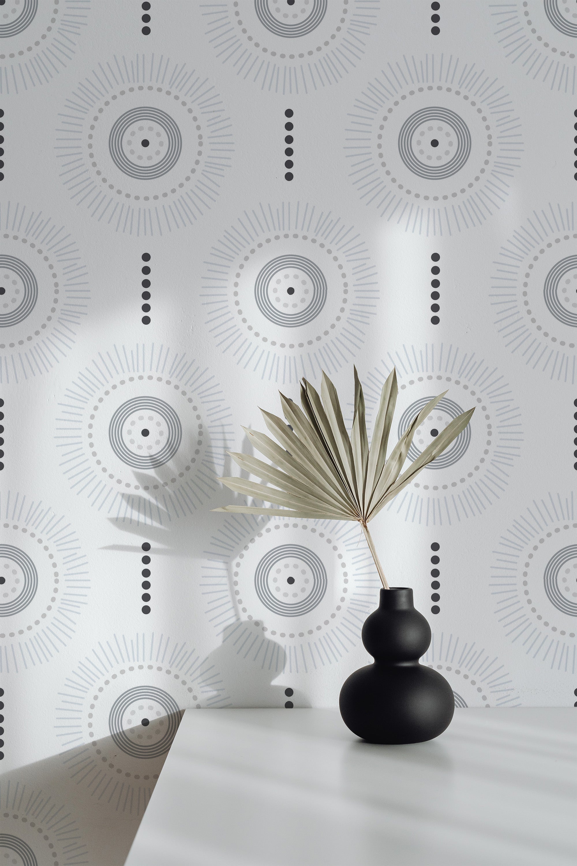 Self-adhesive Bohemian circle wallpaper pattern with geometric and sunburst designs, accentuating a modern interior.