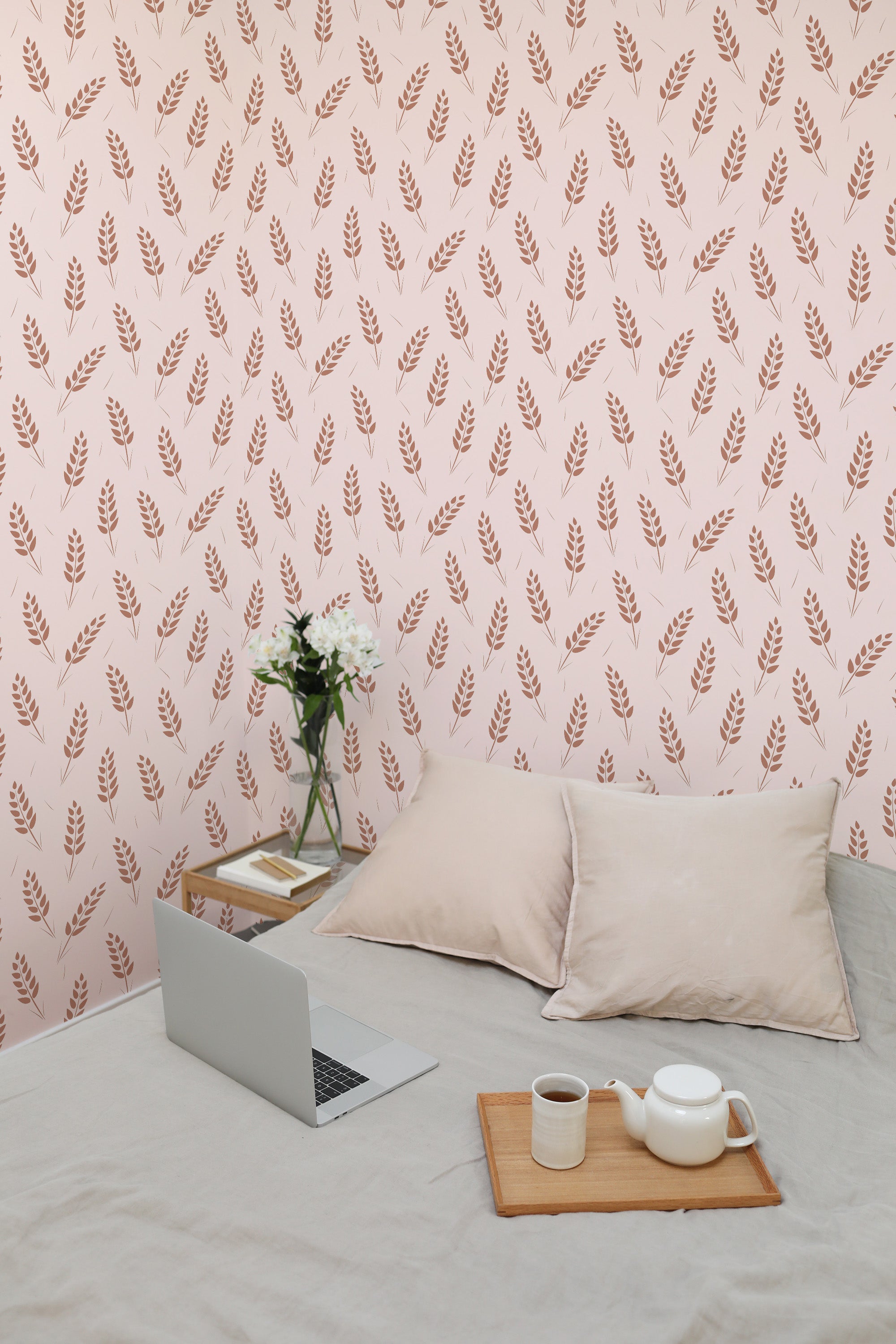 Self-adhesive wallpaper with a Bakery design, featuring a pattern of wheat stalks in a light brown shade against a soft pink background, creating a cozy, rustic ambiance in the room.