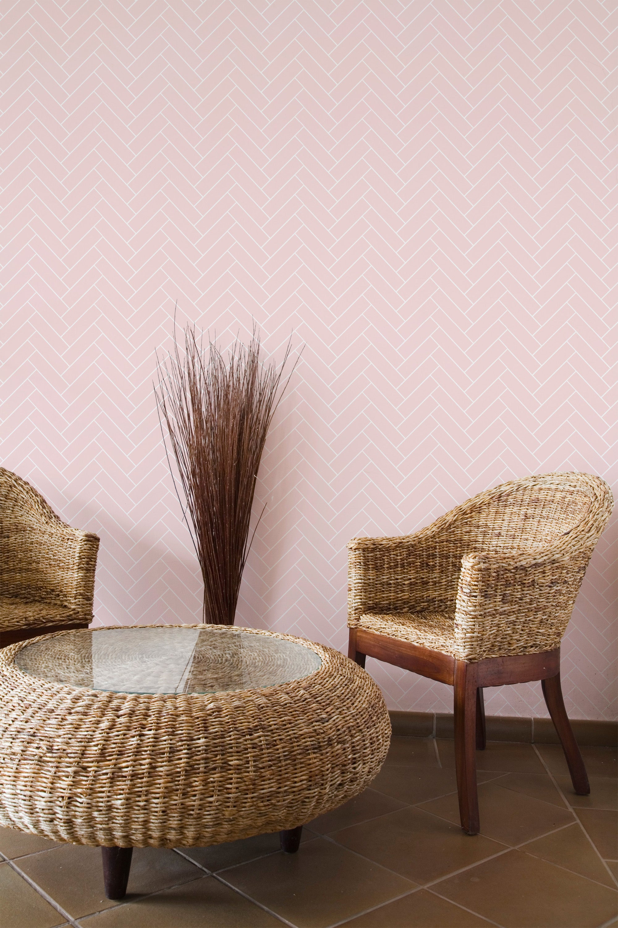 Self-adhesive wallpaper with a soft pink herringbone pattern, creating a subtle, elegant texture.