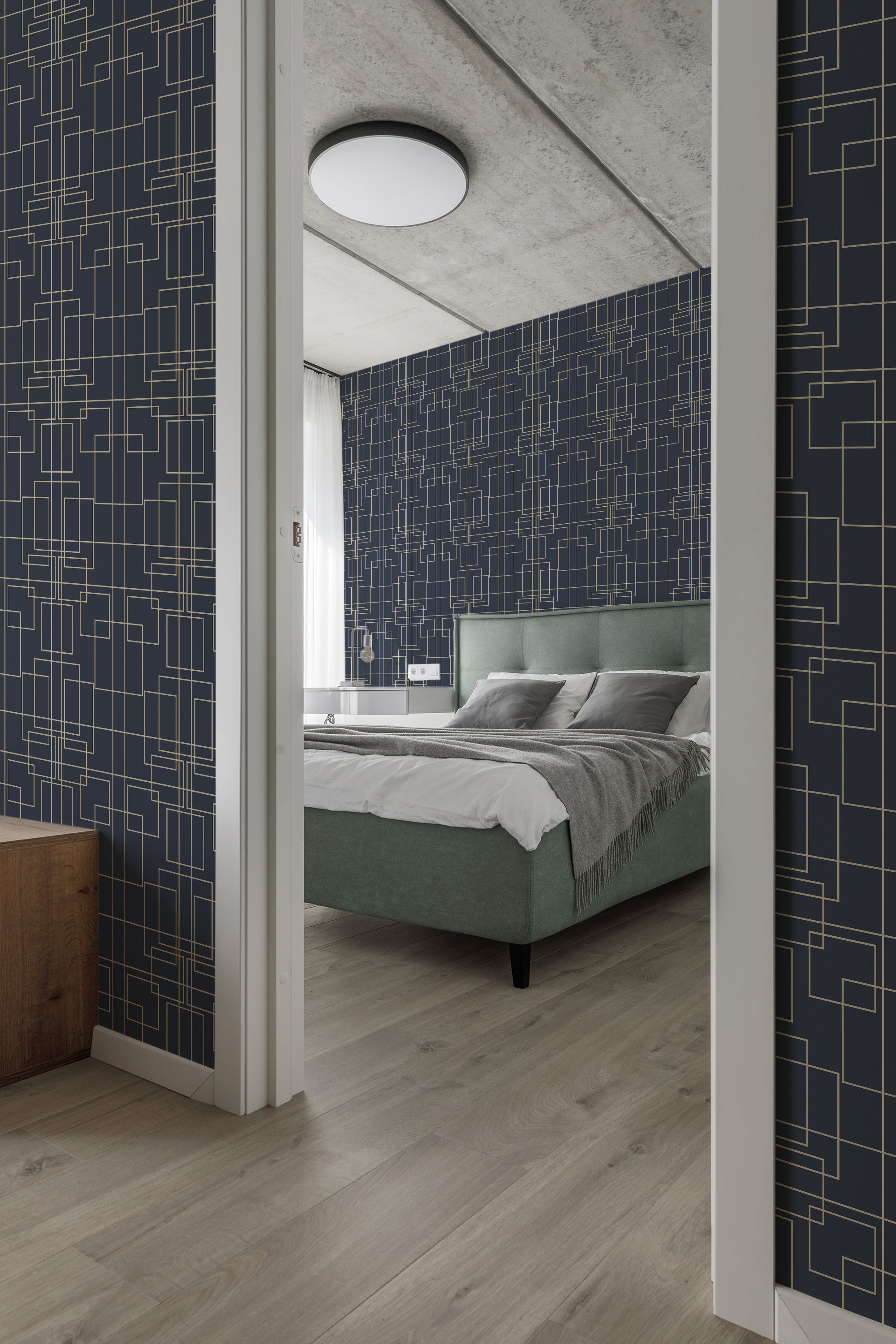 Blue and gold geometric patterned wallpaper with strong Art Deco influences in a stylish bedroom interior, evoking a The Great Gatsby theme, a classic yet modern look as traditional wallpaper.