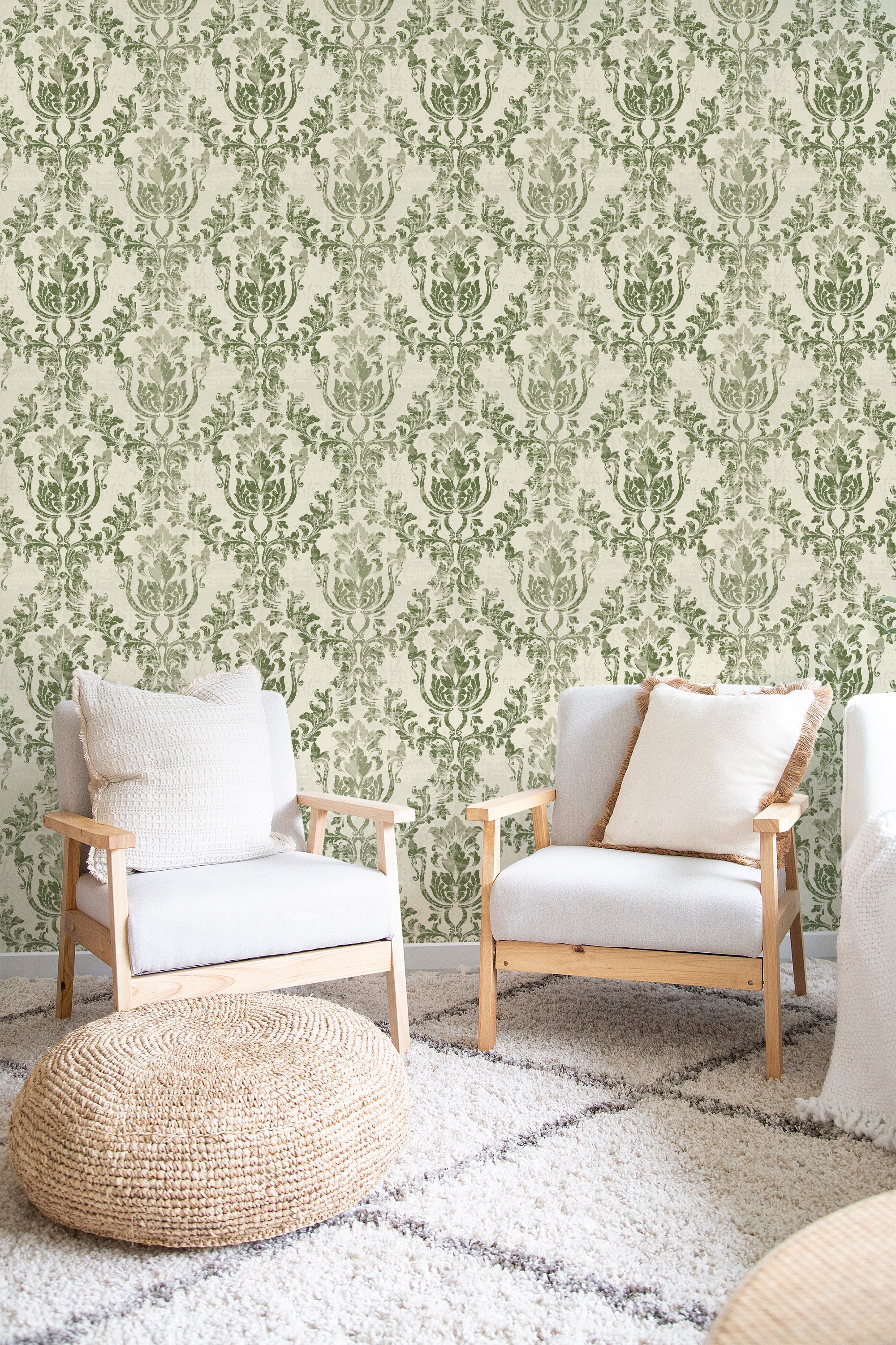 cozy living room soft armchairs pillows earthy damask wall decor
