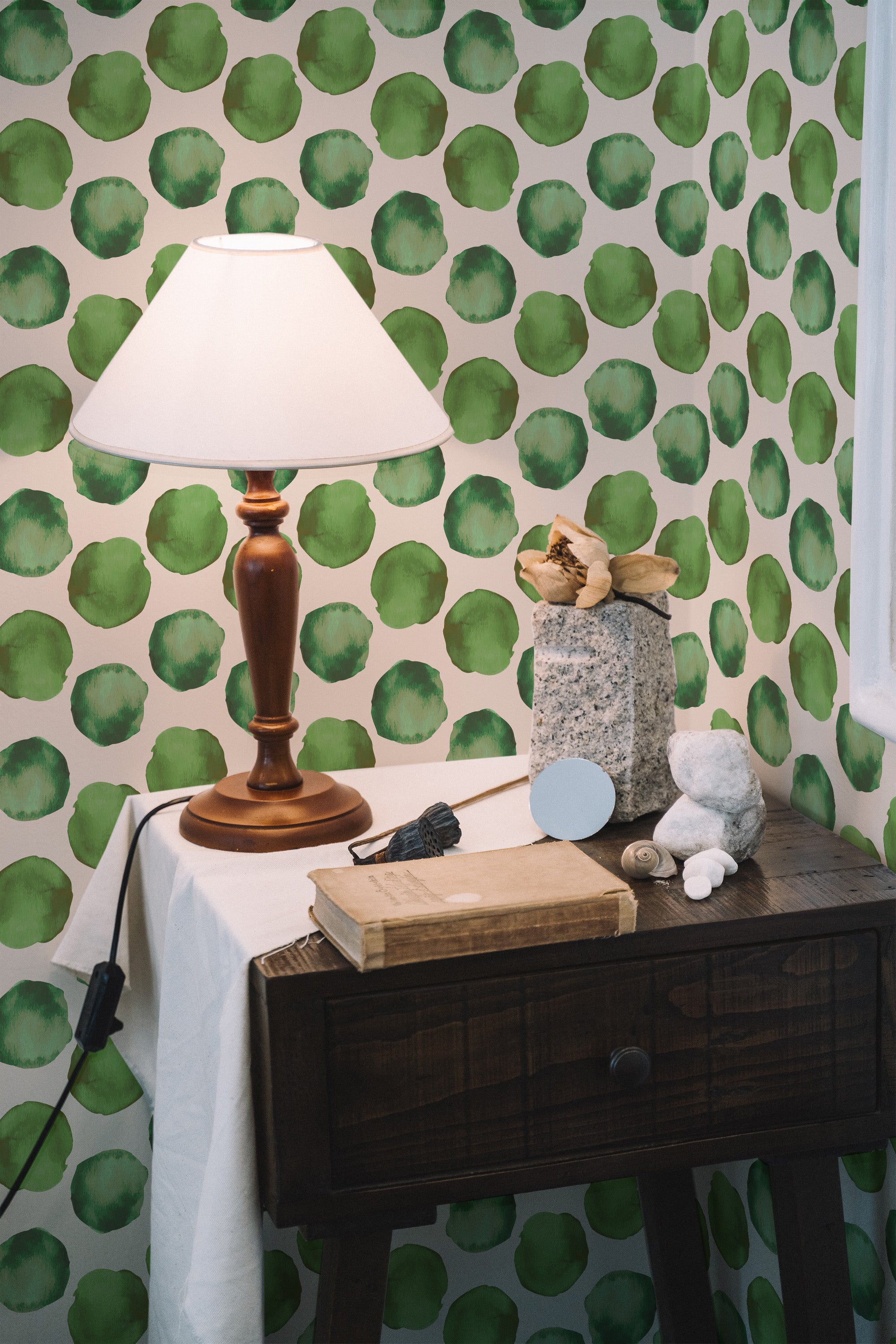 peel and stick wallpaper green watercolor dots pattern accent wall bedroom nightstand interior
