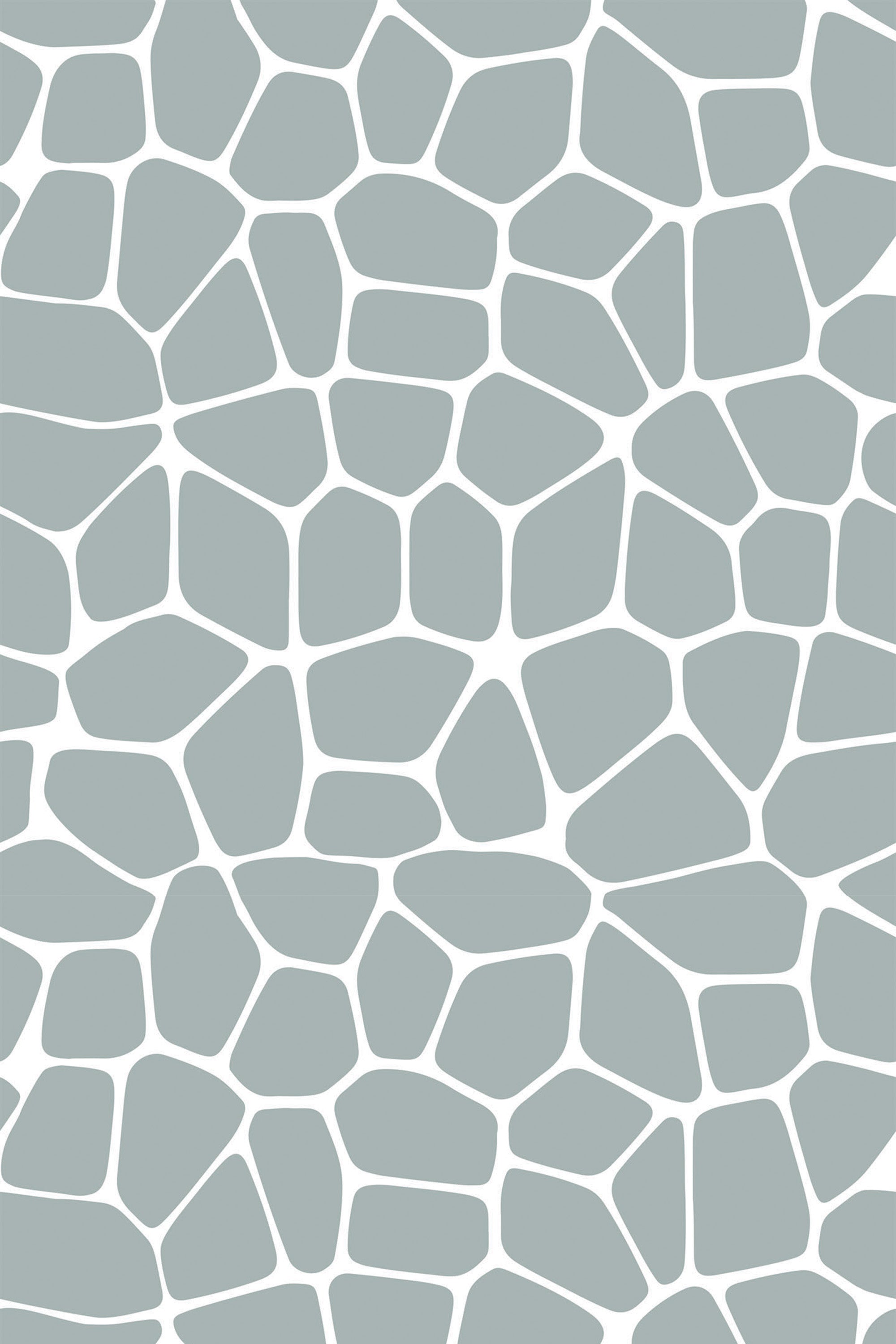 Scattered large, irregular stone-like shapes in soft sage green on a white background, creating a modern terrazzo pattern. Peel and stick removable wallpaper.