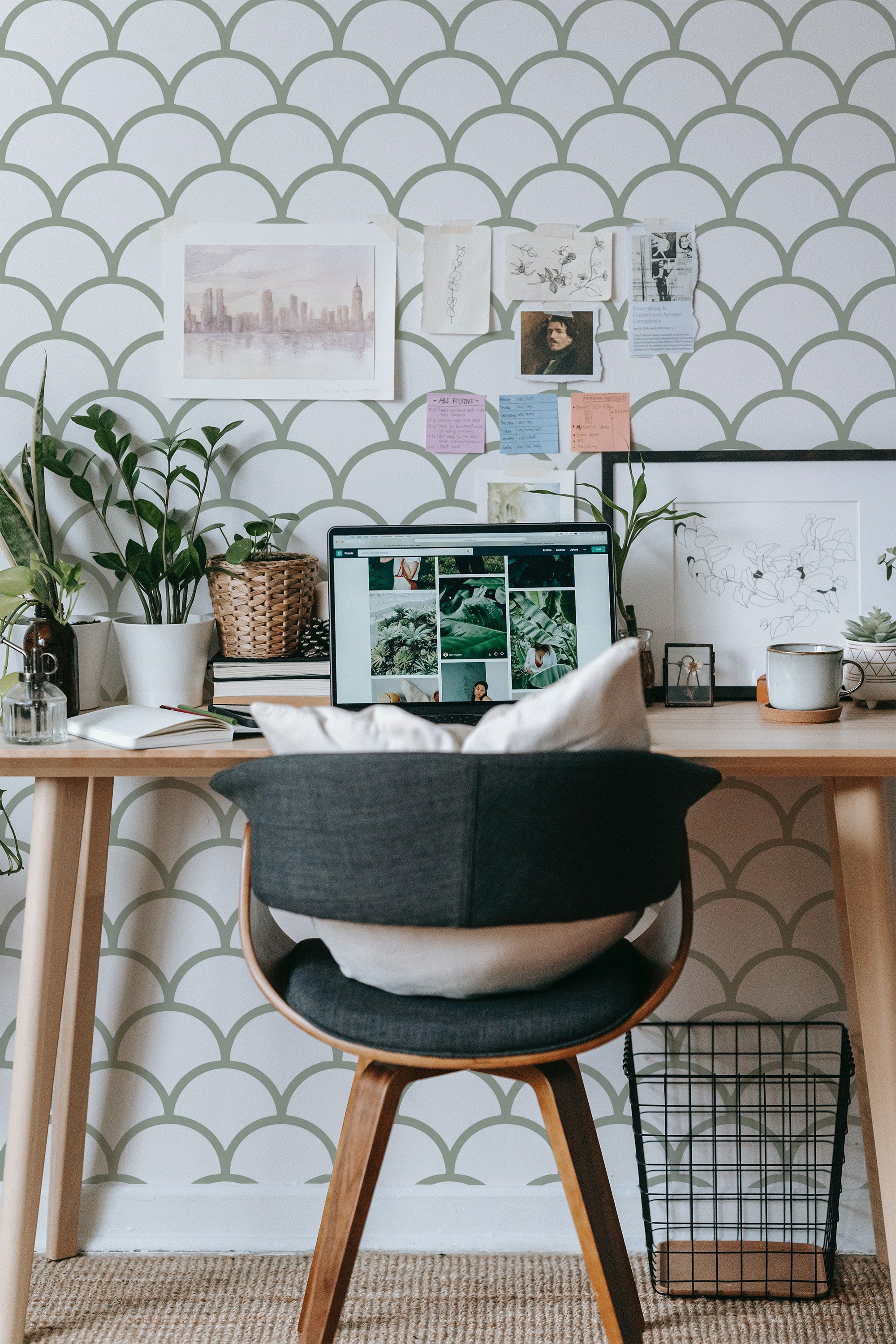 Self-adhesive wallpaper with a soothing oval tile pattern in soft pastel tones, creating a scallop-like visual effect on the wall.