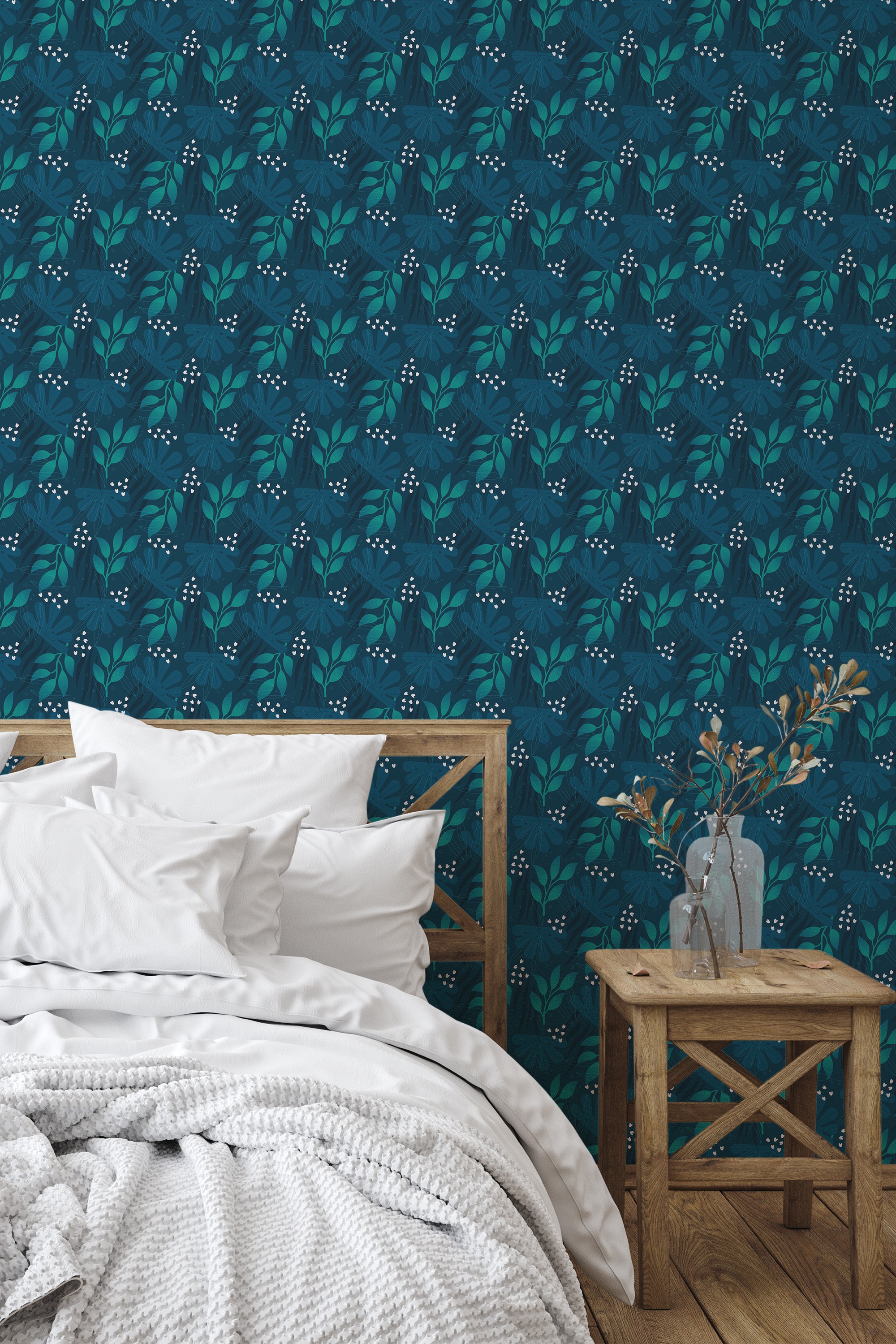 Self-adhesive wallpaper with a dark blue background and intricate leaf patterns in shades of blue and green, creating a calming, nature-inspired ambiance in the room.