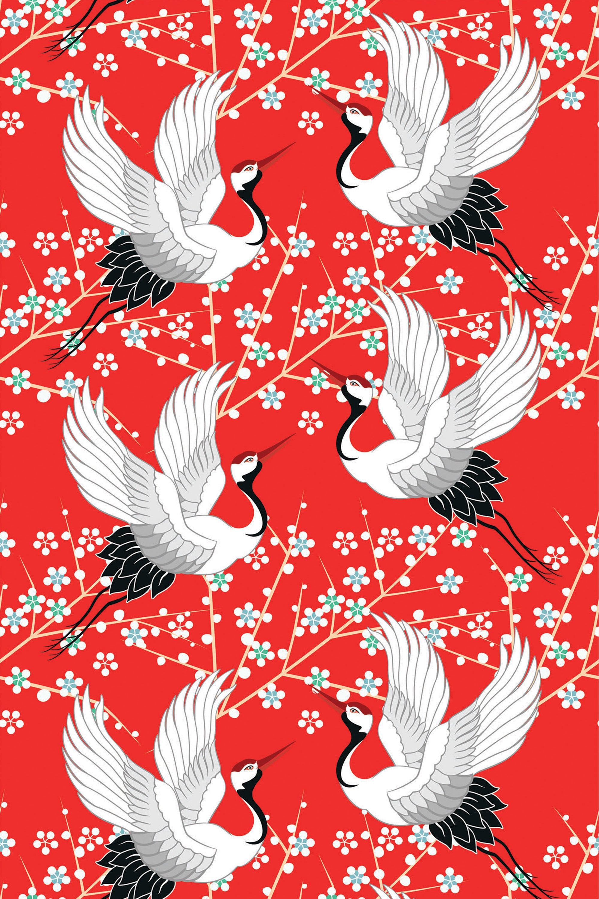 Cranes in elegant flight with outstretched wings, set against a bright red background with delicate white and blue cherry blossoms and branches. Peel and stick removable wallpaper.