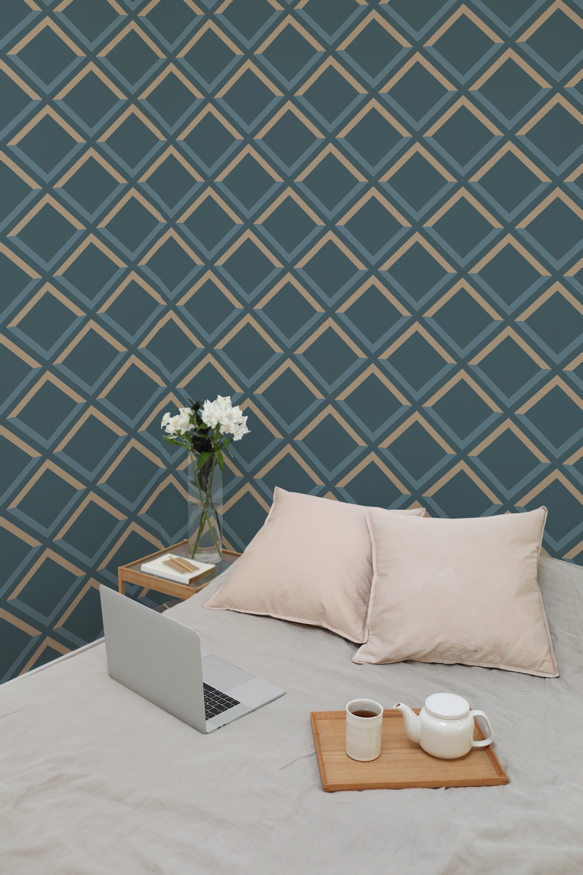 Self-adhesive bold geometric wallpaper with intersecting diamond shapes in shades of dark blue and beige, creating a modern and dynamic pattern.