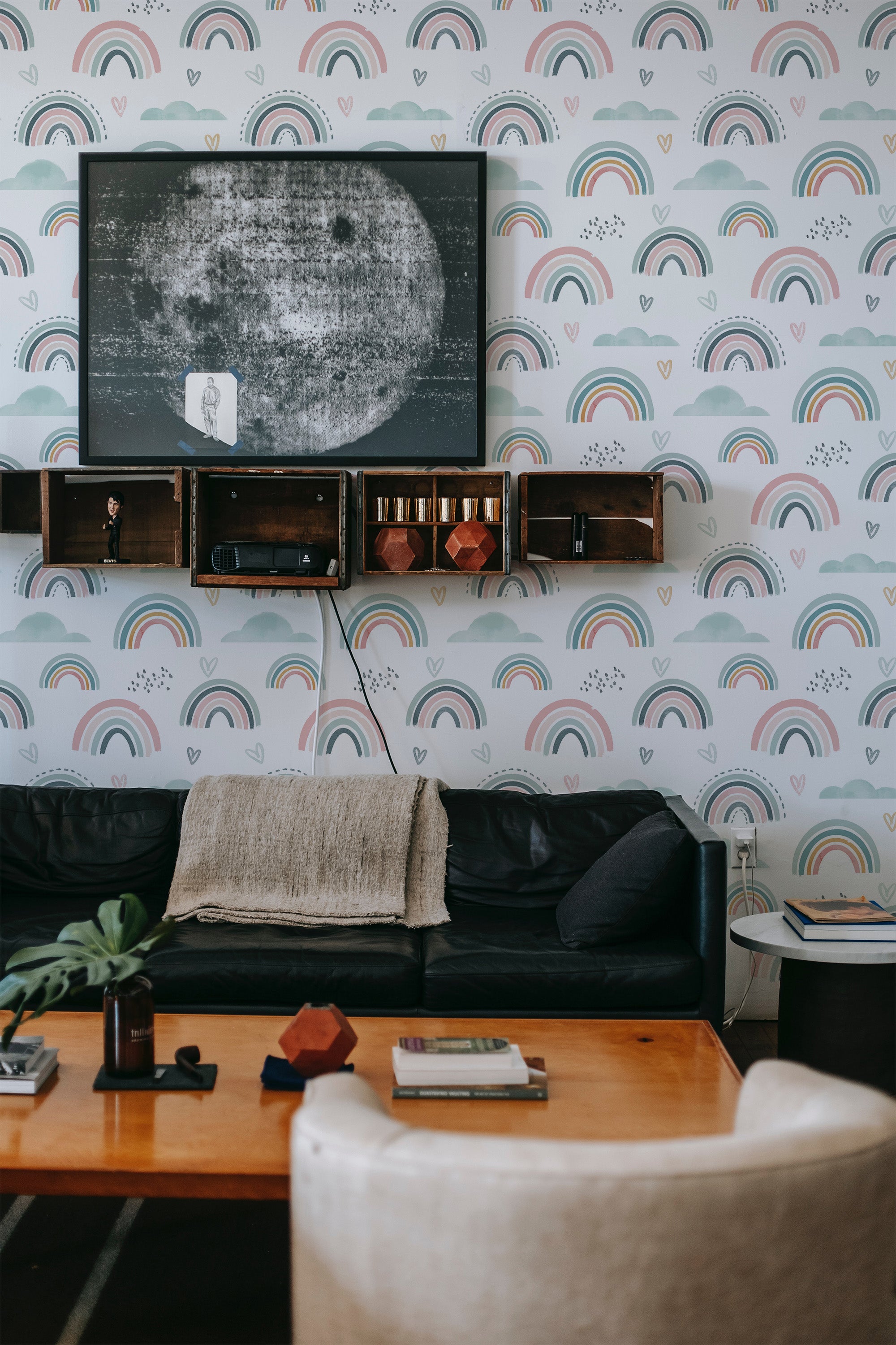 A room with walls covered in pastel-colored rainbow pattern traditional wallpaper.