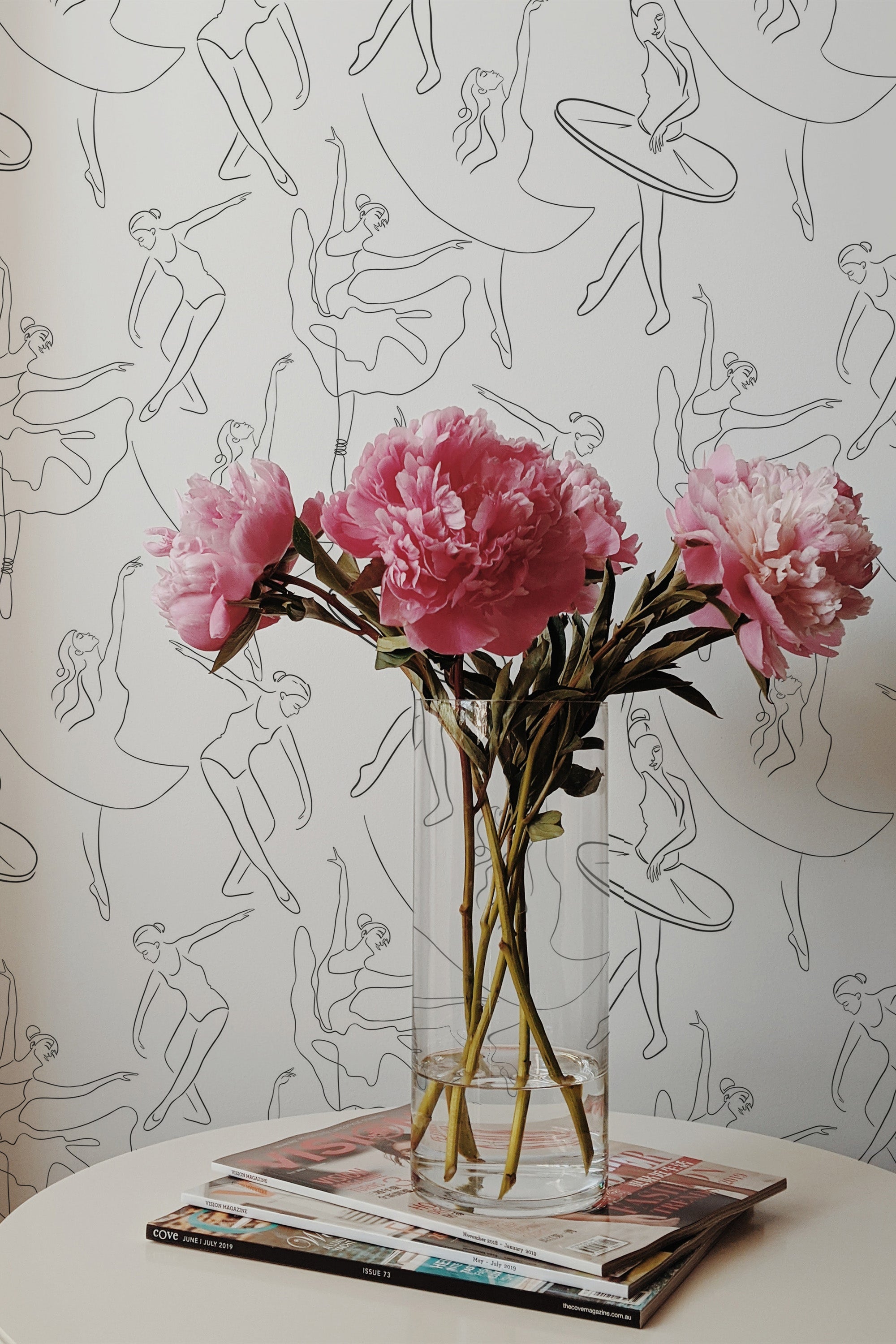 Self-adhesive wallpaper with delicate line drawings of ballet dancers in various graceful poses on a light background.