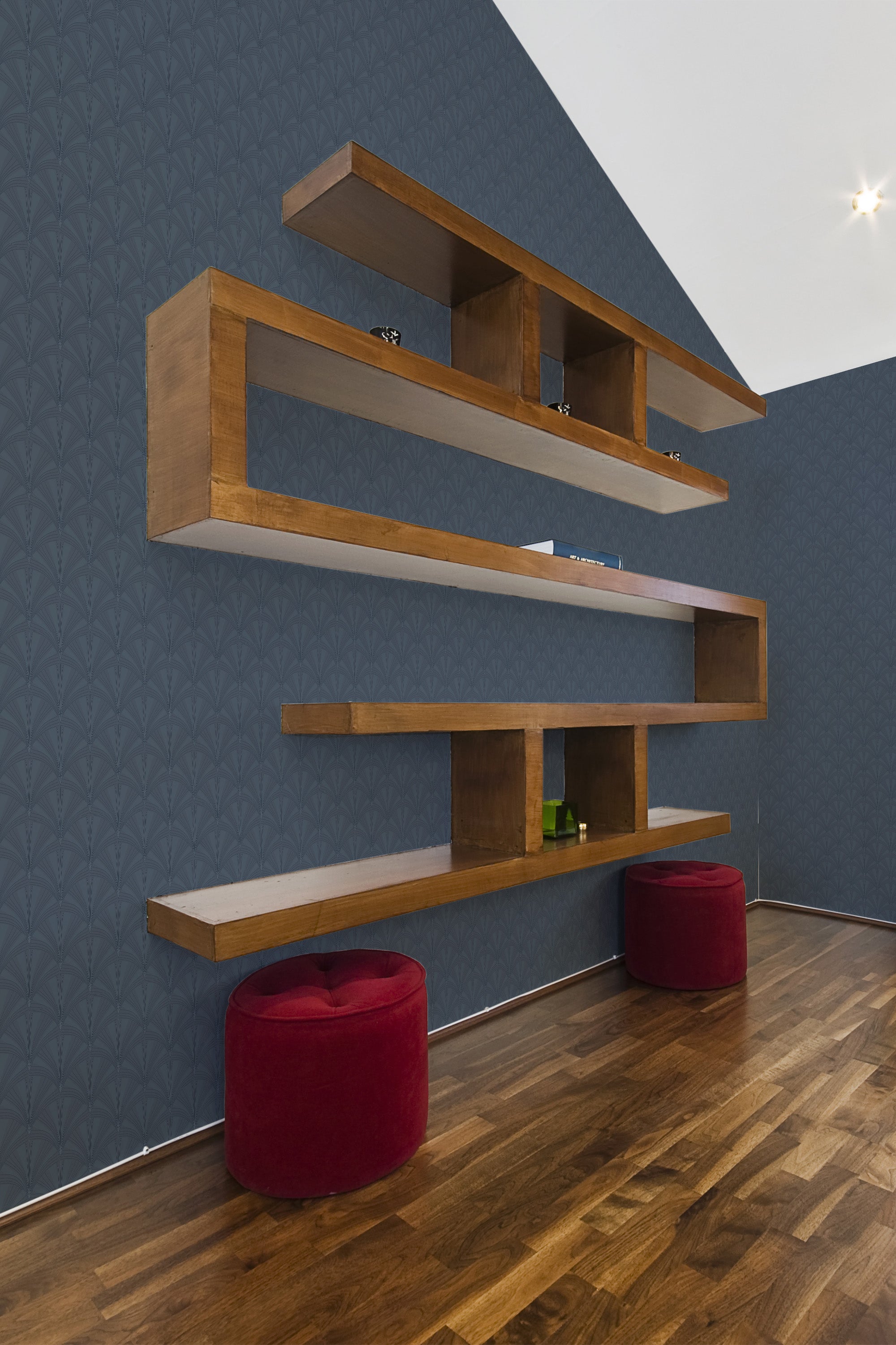 Dark blue Art Deco wallpaper with a geometric fan pattern, highlighting intricate, symmetrical designs in a muted gold tone. Traditional wallpaper.