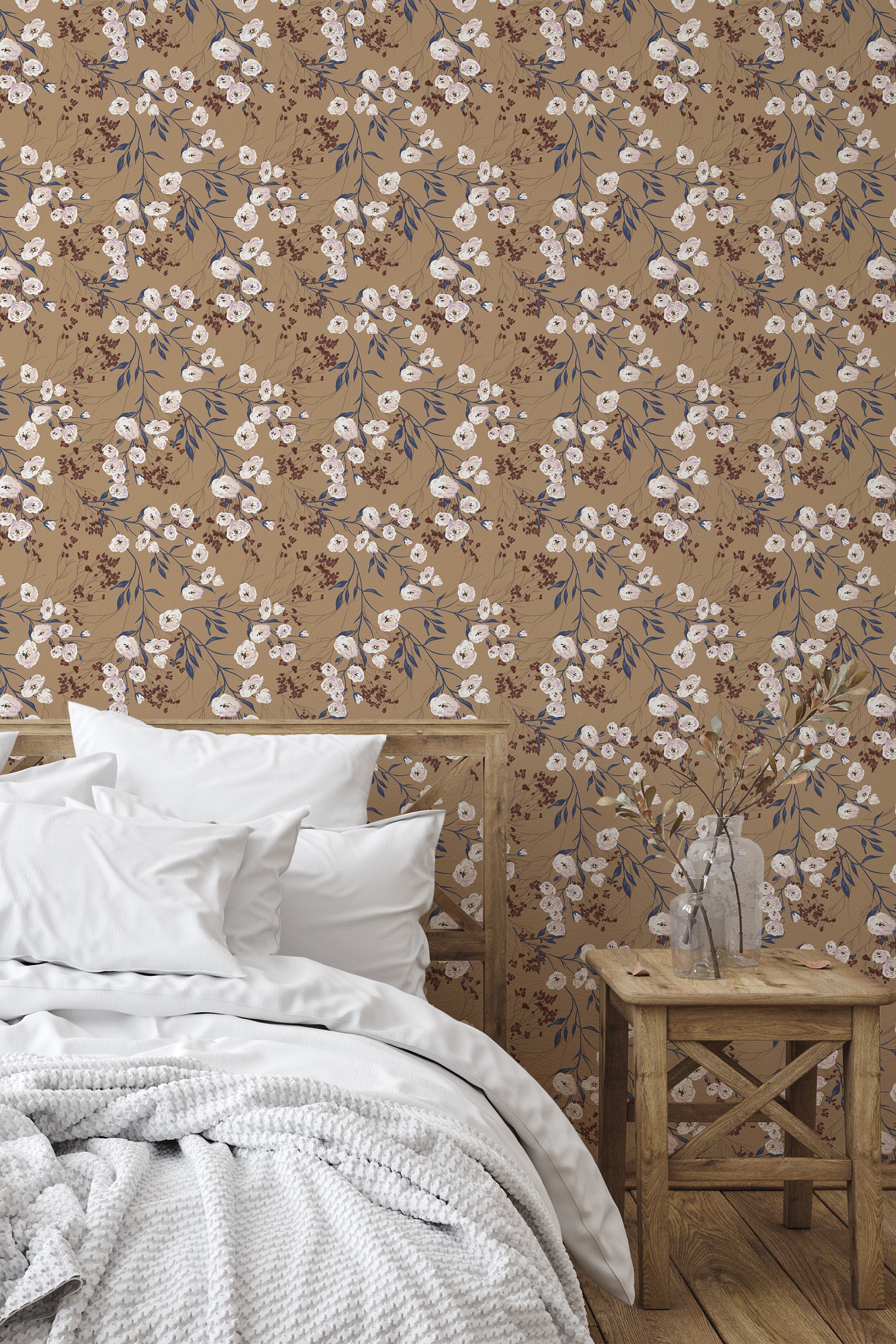 Self-adhesive wallpaper with a retro floral pattern in neutral tones, including white flowers and earthy brown hues, complements a cozy bedroom setting with wooden furniture.