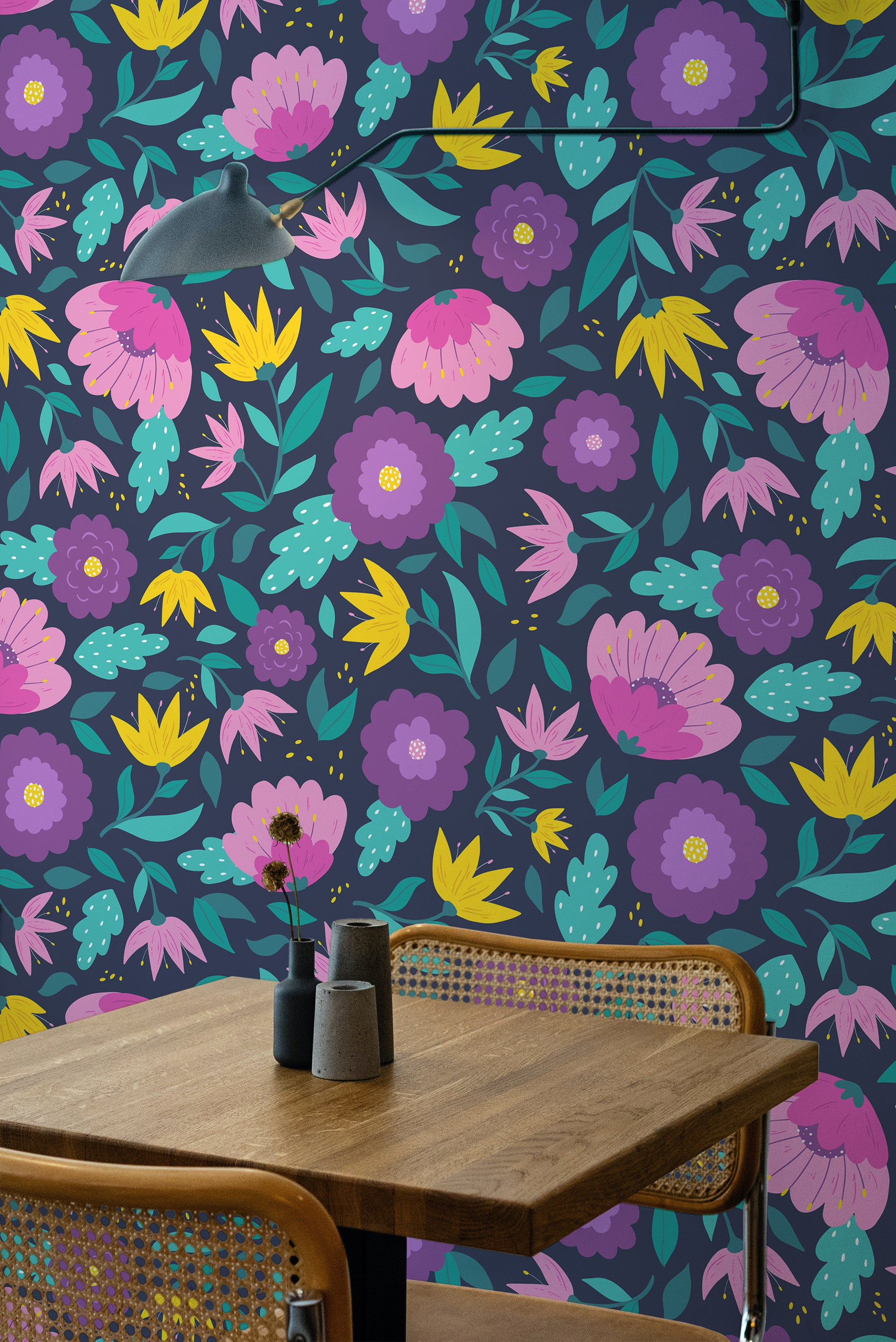 Self-adhesive dark floral wallpaper with vibrant purple, pink, and yellow flowers interwoven with green leaves on a deep, almost-black background. This bold and lively design adds a striking touch to the room, creating a modern and cozy atmosphere.