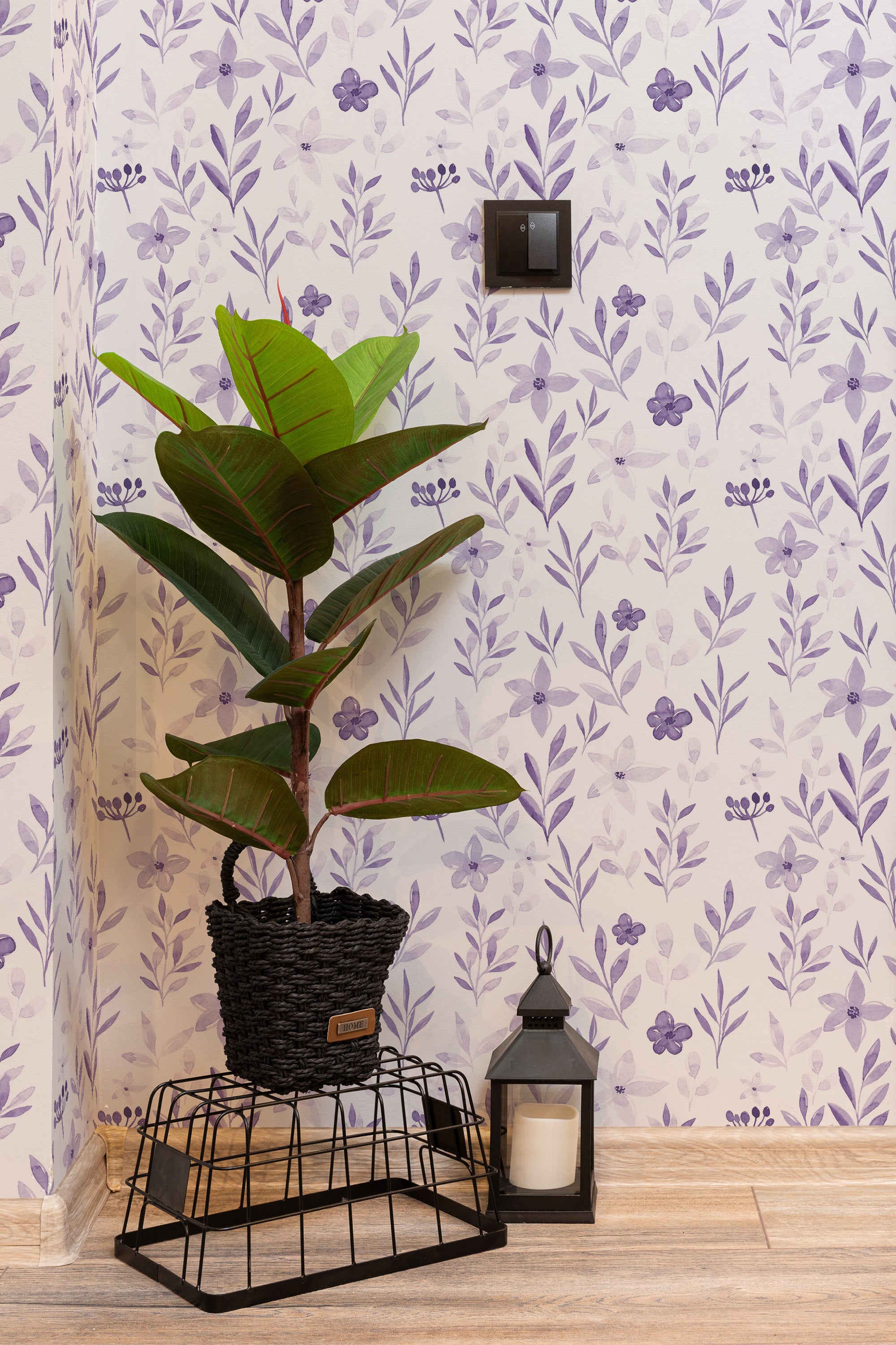Self-adhesive Violet botanical wallpaper with delicate purple flowers and green leaves on a light background, adding a fresh, nature-inspired look to the room.
