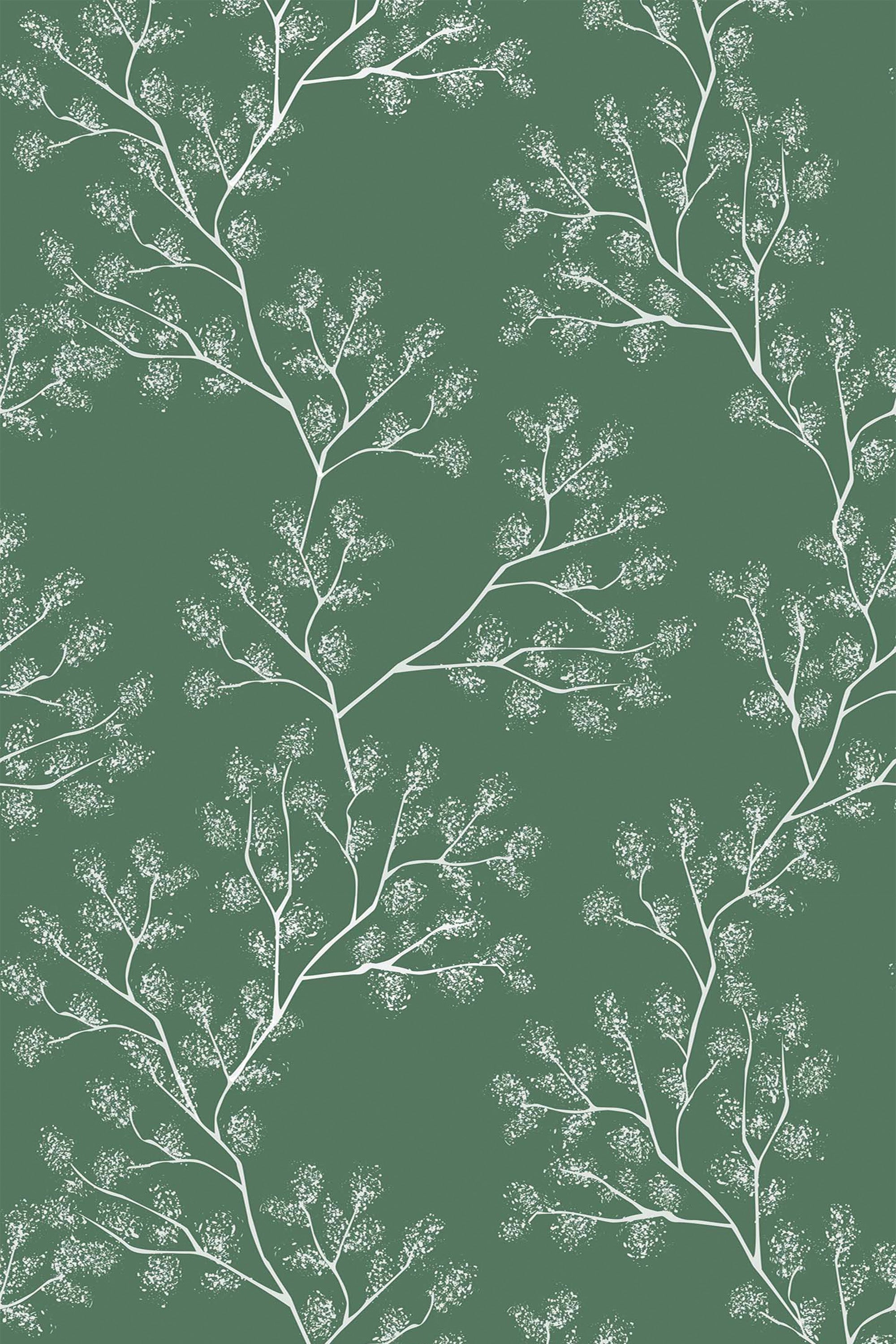 Intricate pattern of white bare tree branches with delicate, snow-like clusters on a solid green background, peel and stick removable wallpaper.