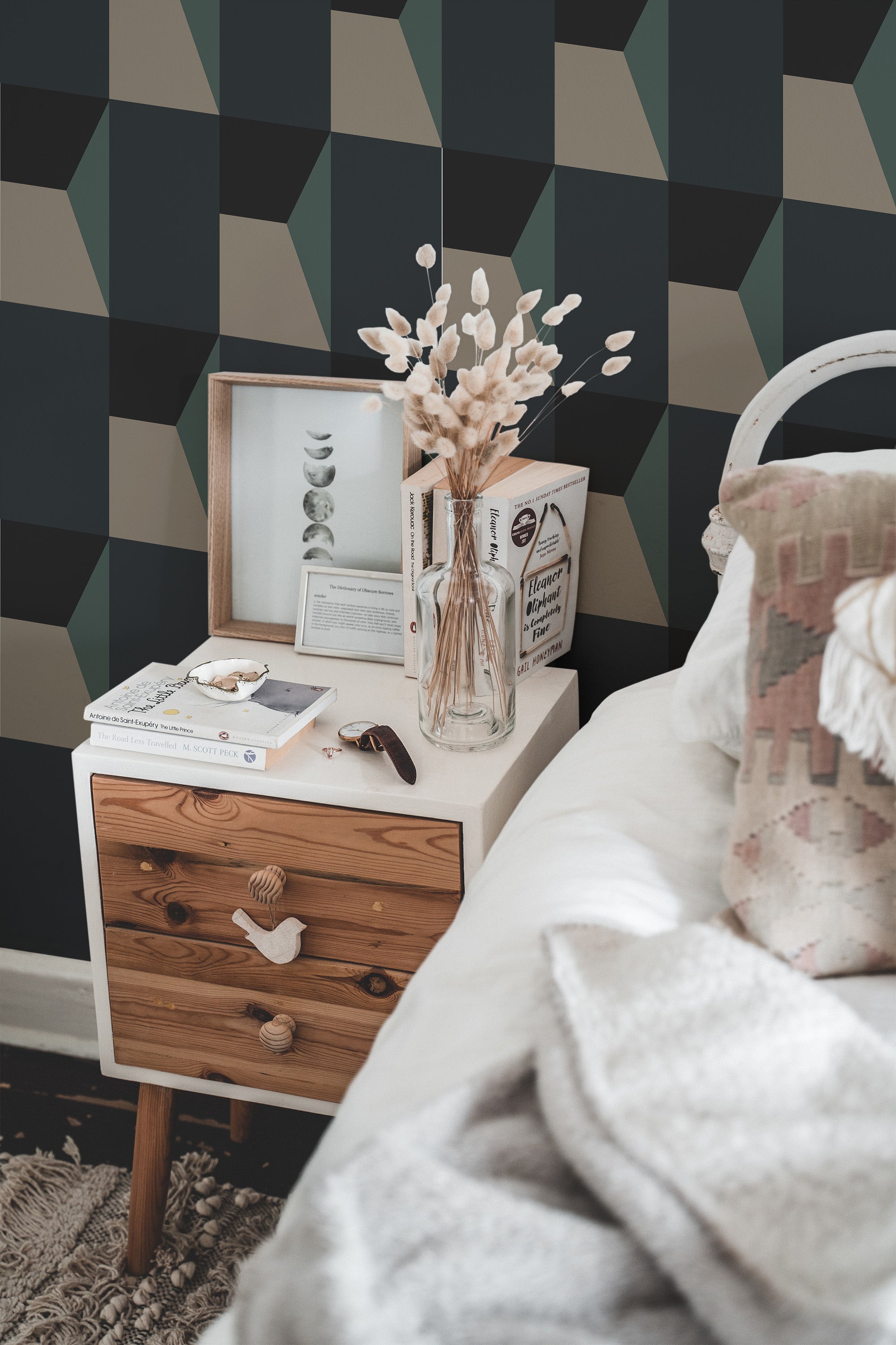 Self-adhesive blue bold geometric wallpaper with 3D cube pattern in shades of blue, black, and beige, enhancing the modern aesthetic of the room.