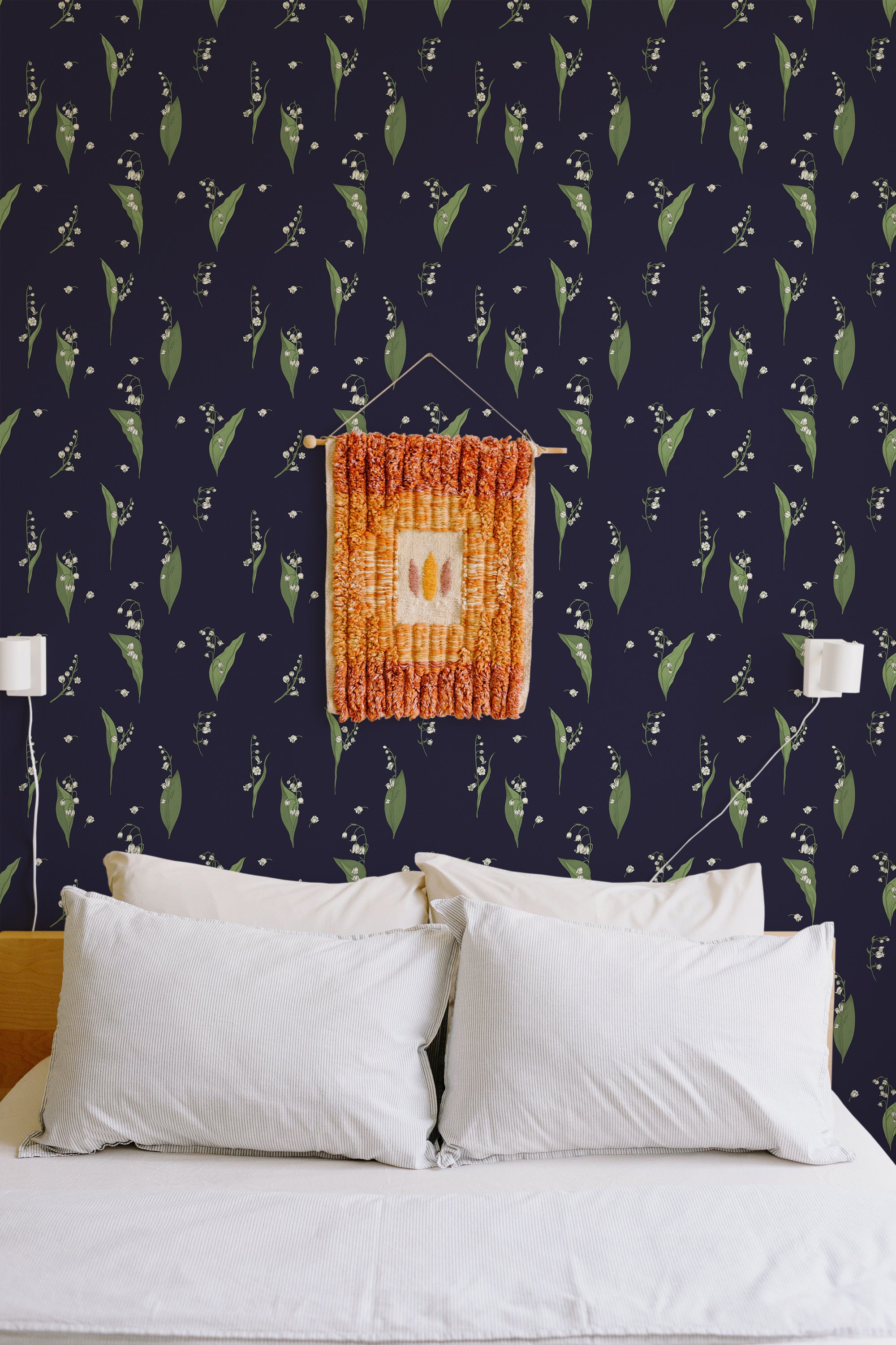 Self-adhesive wallpaper with a Bold Snowdrops design on a dark background, featuring delicate white snowdrop flowers and green leaves.