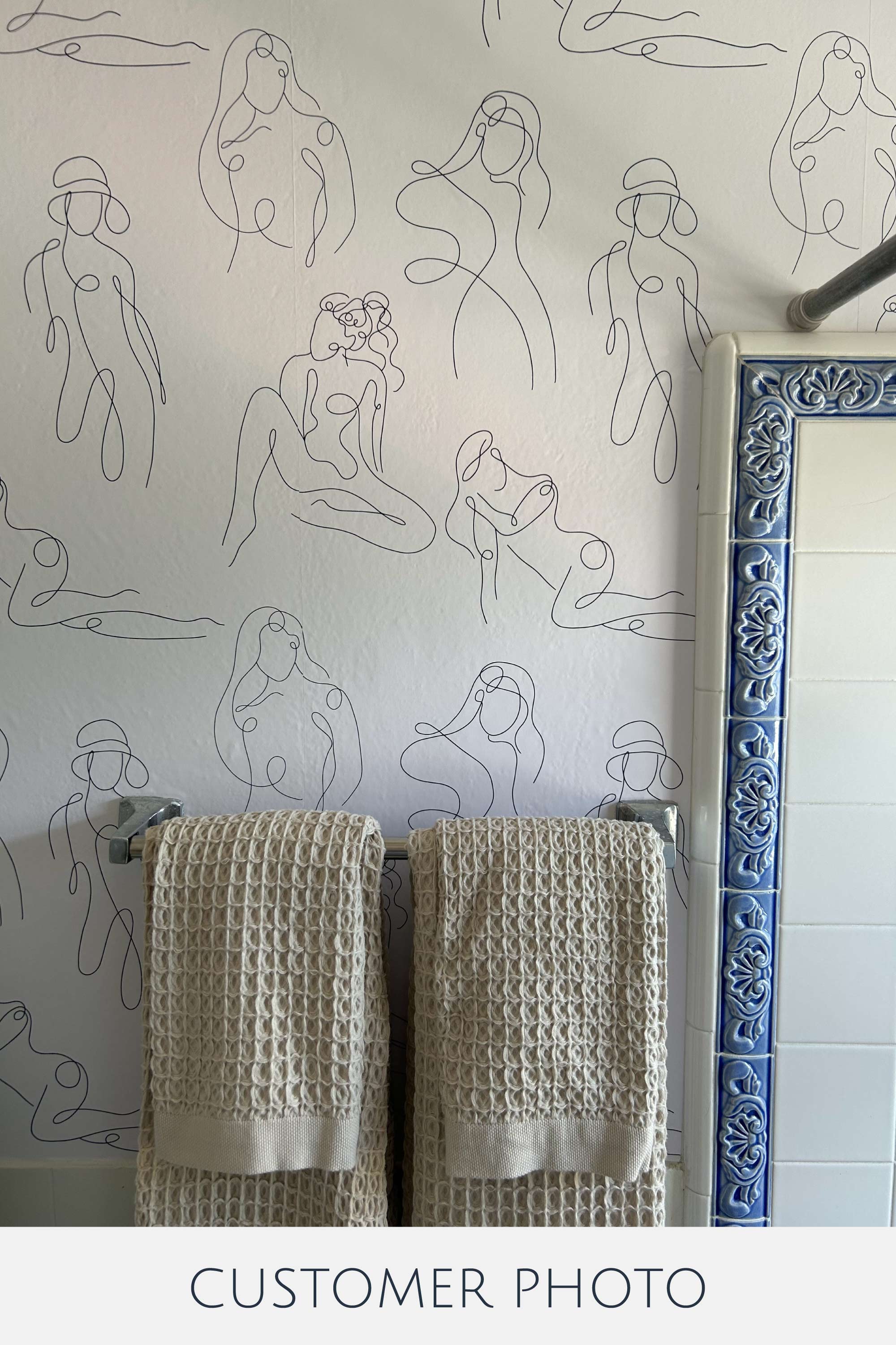 Line drawings of abstract human figures in various poses adorn the wallpaper in minimalist black outlines, creating a modern yet subtle aesthetic. The wallpaper design adds an artistic and elegant touch to the room, while embracing a minimalist and uncluttered style. Traditional wallpaper.
